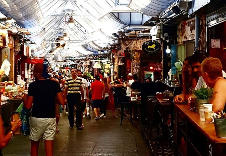 Private Tour to the Culinary World of Jerusalem Market - Meeting Nissim Slama in Front of the Mural
